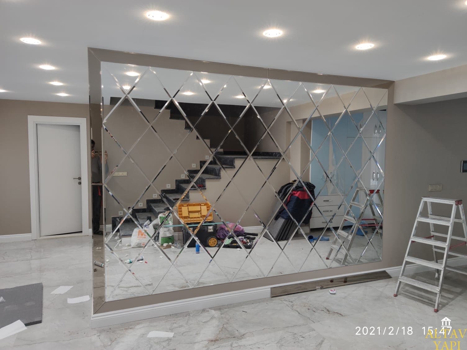 Contemporary frameless shower door with brushed nickel hardware and clear tempered glass