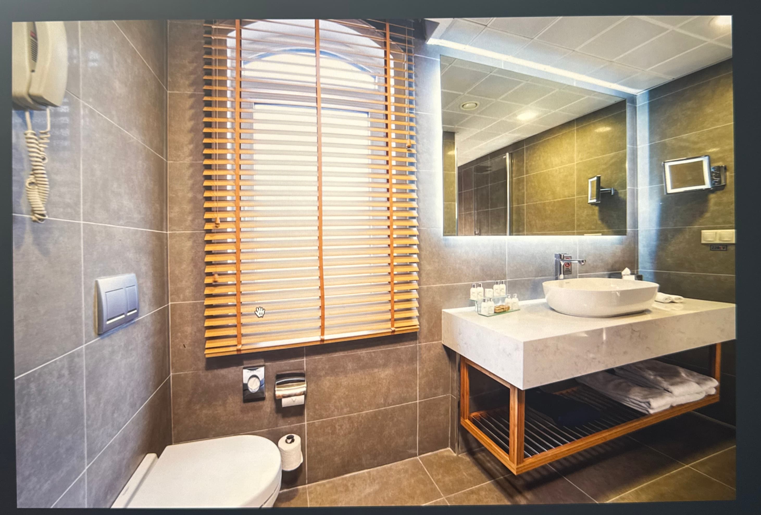 Modern frameless bathroom mirror with contemporary design in Cary home