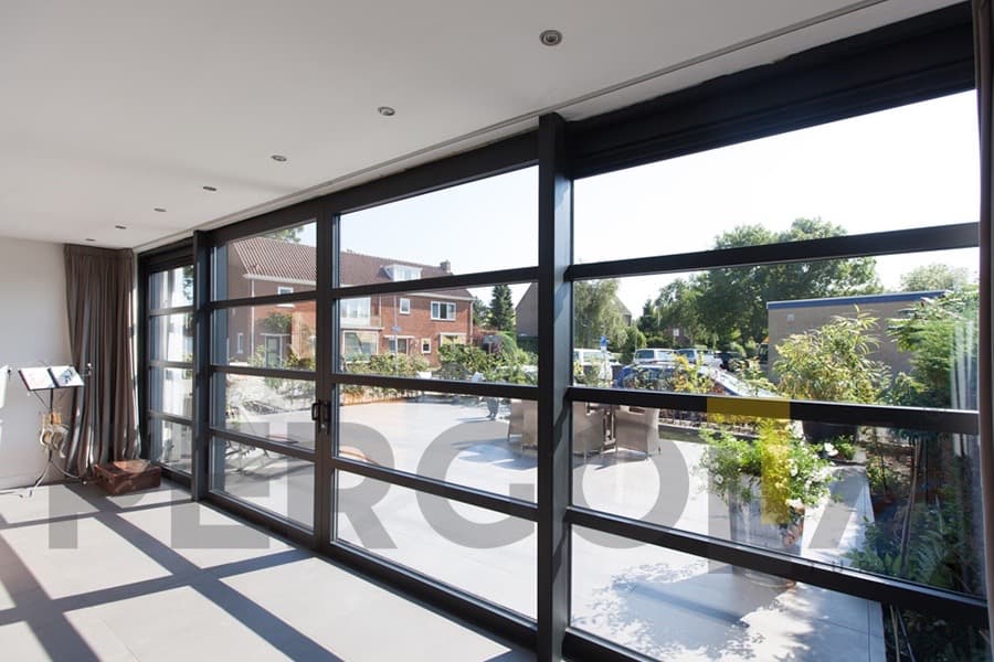 Custom glass and aluminum pergola installation for outdoor living space in Raleigh